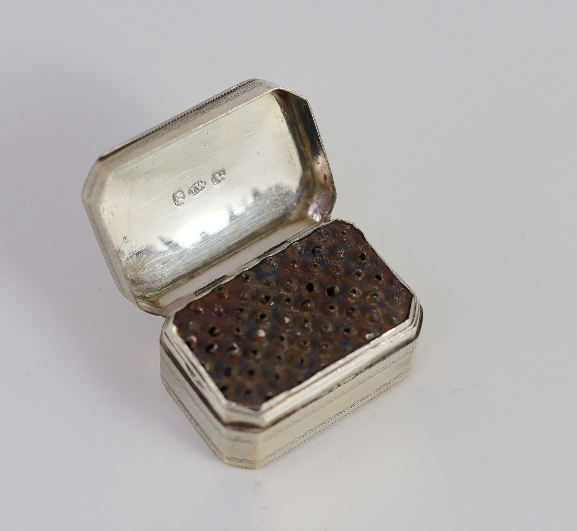 A George III silver octagonal nutmeg grater, by Joseph Wilmore